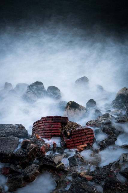 Waves over rocks, long exposure